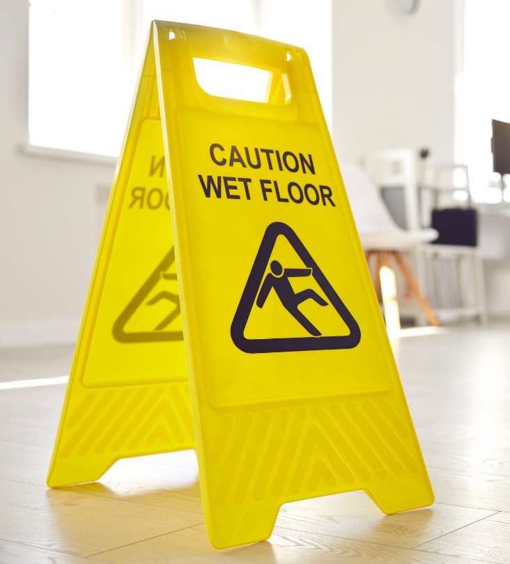 sign warning about wet floor placed in office cottonwood heights ut